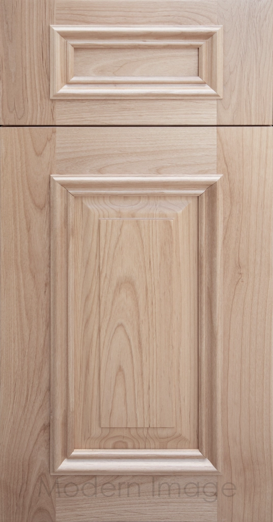 Heritage custom cabinets in a Ghost matte Stain, classic raised panel doors, and modern flat slab drawer fronts.